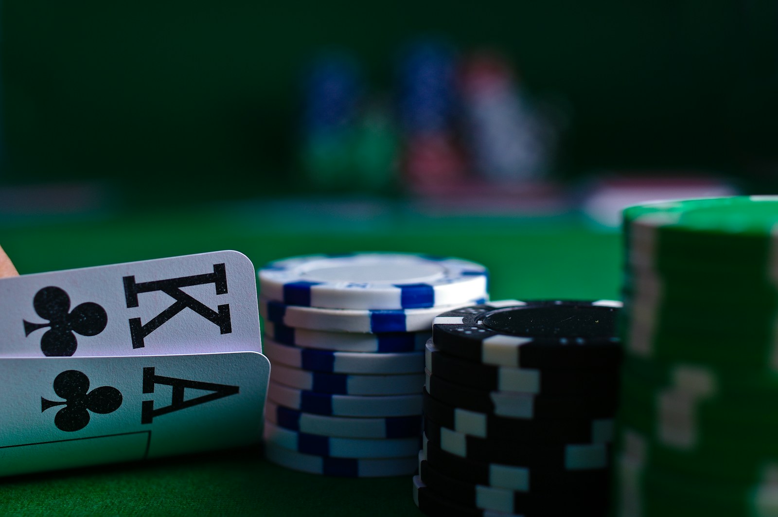 Poker chips and cards on a gaming table